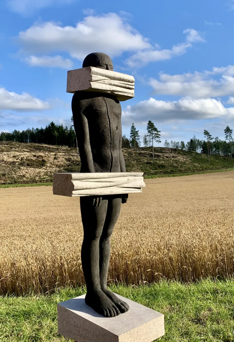 Silenced, 110x50x40 cm, burnt wood and granit
